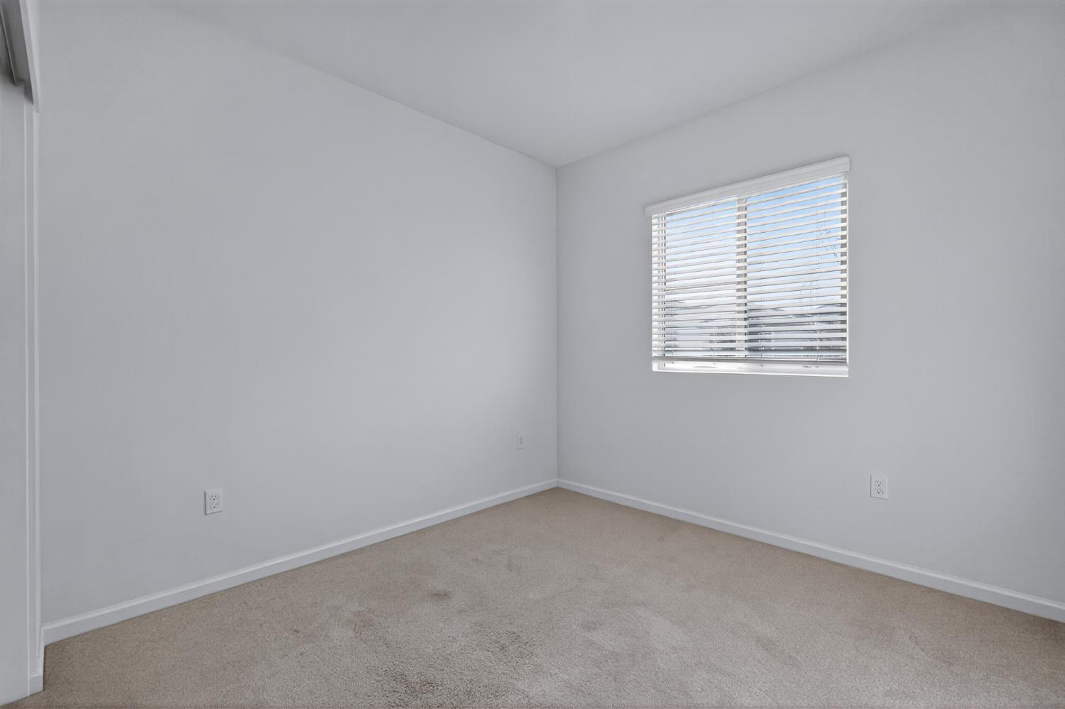 12829 Scholarly Way Rancho Cordova, CA 95742 - Photo 7 of 33 an empty room with a window