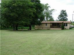 2348 Kinneys Road Cedar Hill, TN 37032 - Photo 1 of 5 a view of house with yard and outdoor seating