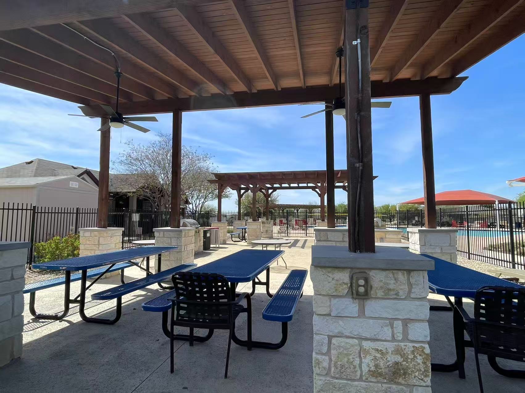457 Dragon Ridge Road Buda, TX 78610 - Photo 28 of 29 View of patio featuring ceiling fan, a pergola, and an outdoor bar