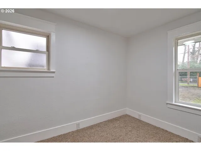 an empty room with a window