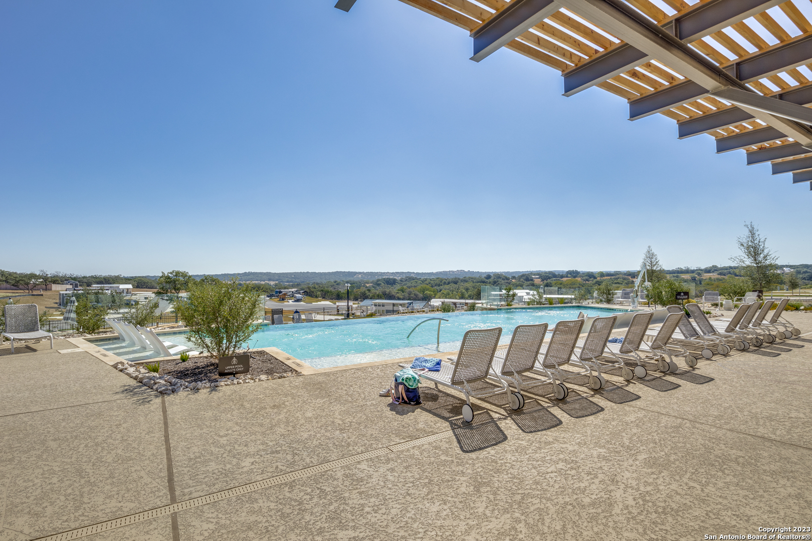 5386 Ranch Road 1376 Fredericksburg, TX 78624 - Photo 17 of 30 an outdoor space with patio swimming pool and outdoor seating