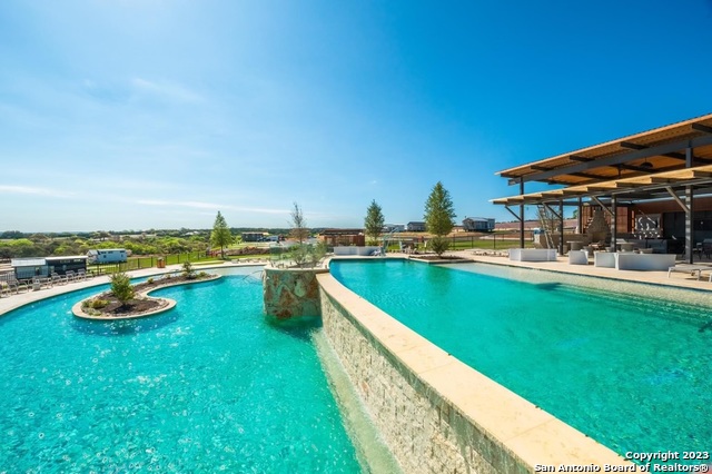 5386 Ranch Road 1376 Fredericksburg, TX 78624 - Photo 20 of 30 a view of swimming pool with outdoor seating and deck