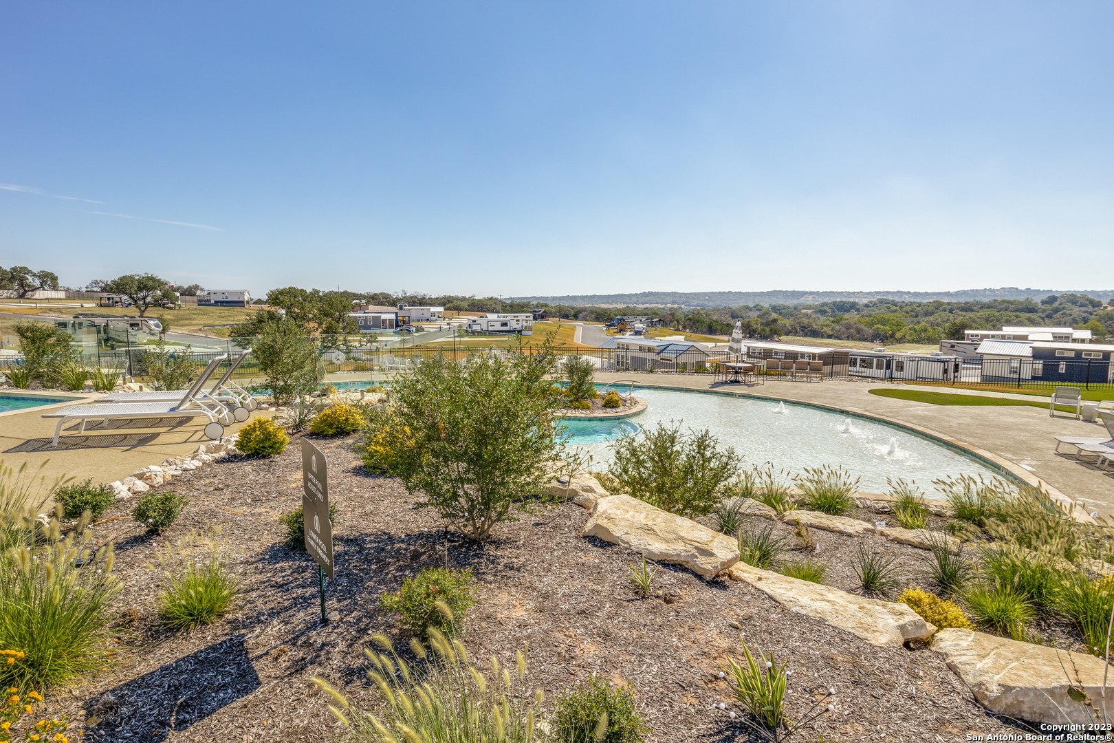 5386 Ranch Road 1376 Fredericksburg, TX 78624 - Photo 22 of 30 a view of a lake with a city