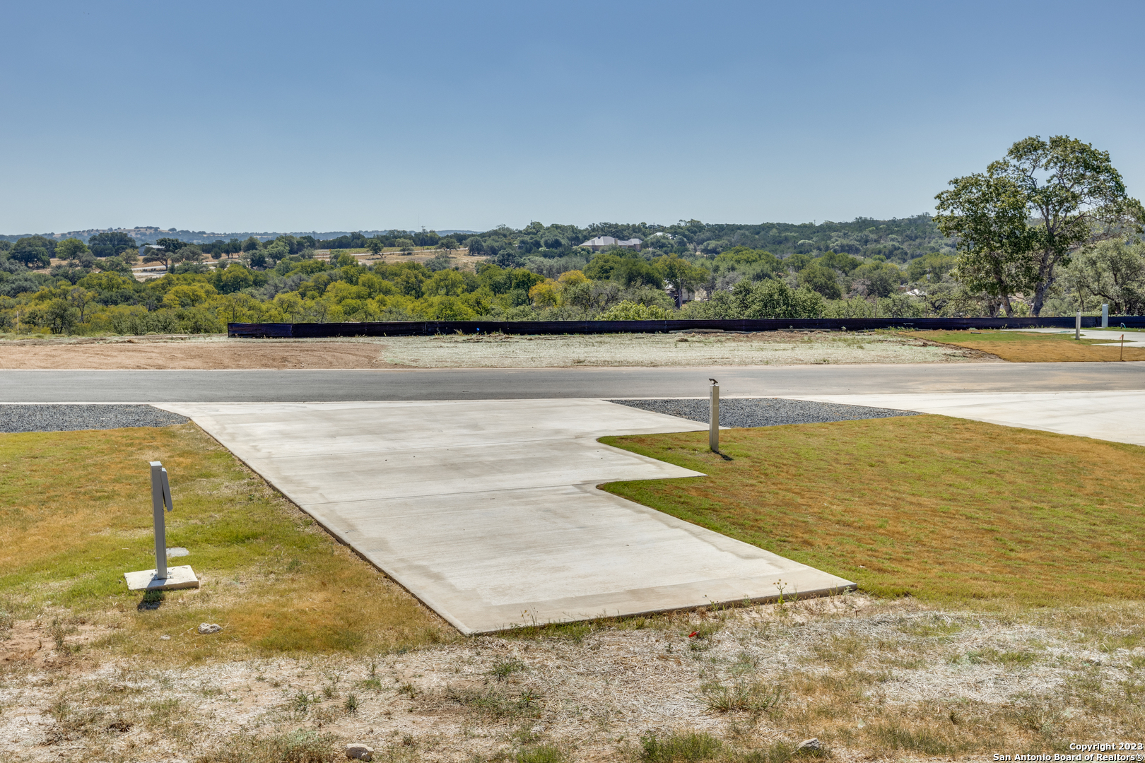 5386 Ranch Road 1376 Fredericksburg, TX 78624 - Photo 25 of 30 a view of a swimming pool and lake