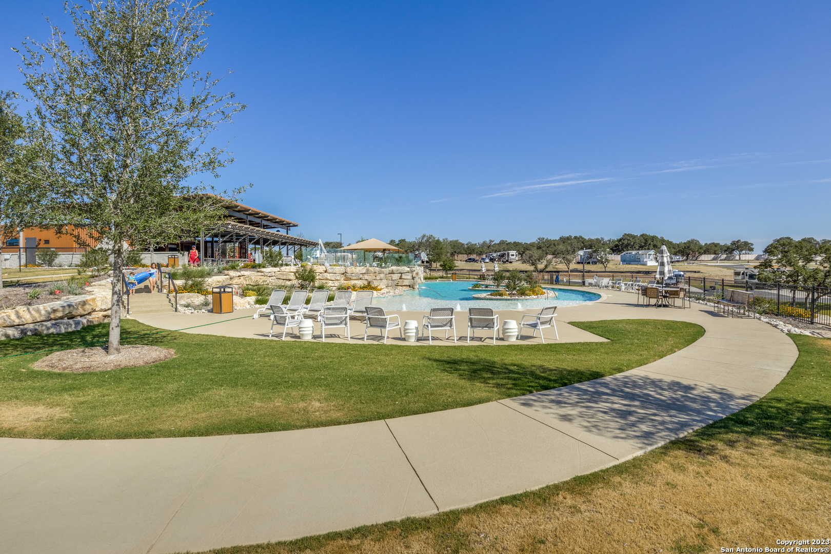 5386 Ranch Road 1376 Fredericksburg, TX 78624 - Photo 5 of 30 a view of a swimming pool and a yard