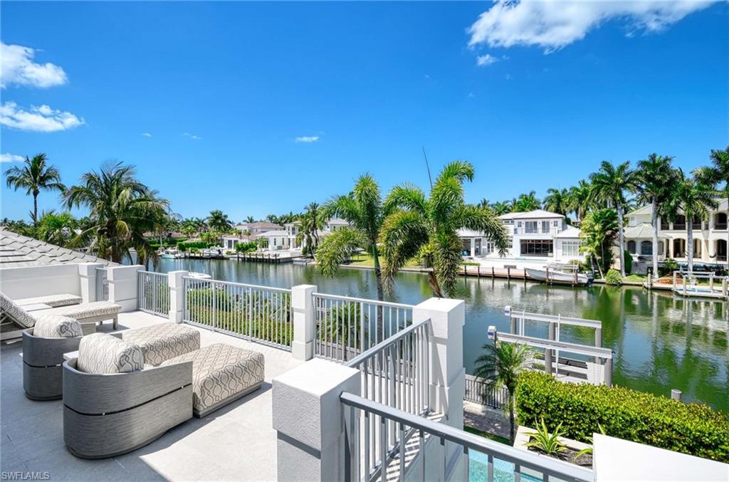 1888 6th Street South Naples, FL 34102 - Photo 33 of 37 a house view with a lake view