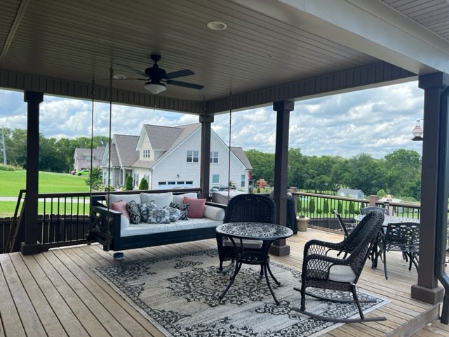 488 Cole's Ferry Road Gallatin, TN 37066 - Photo 14 of 43 a outdoor space with patio the couches and a dining table with garden view