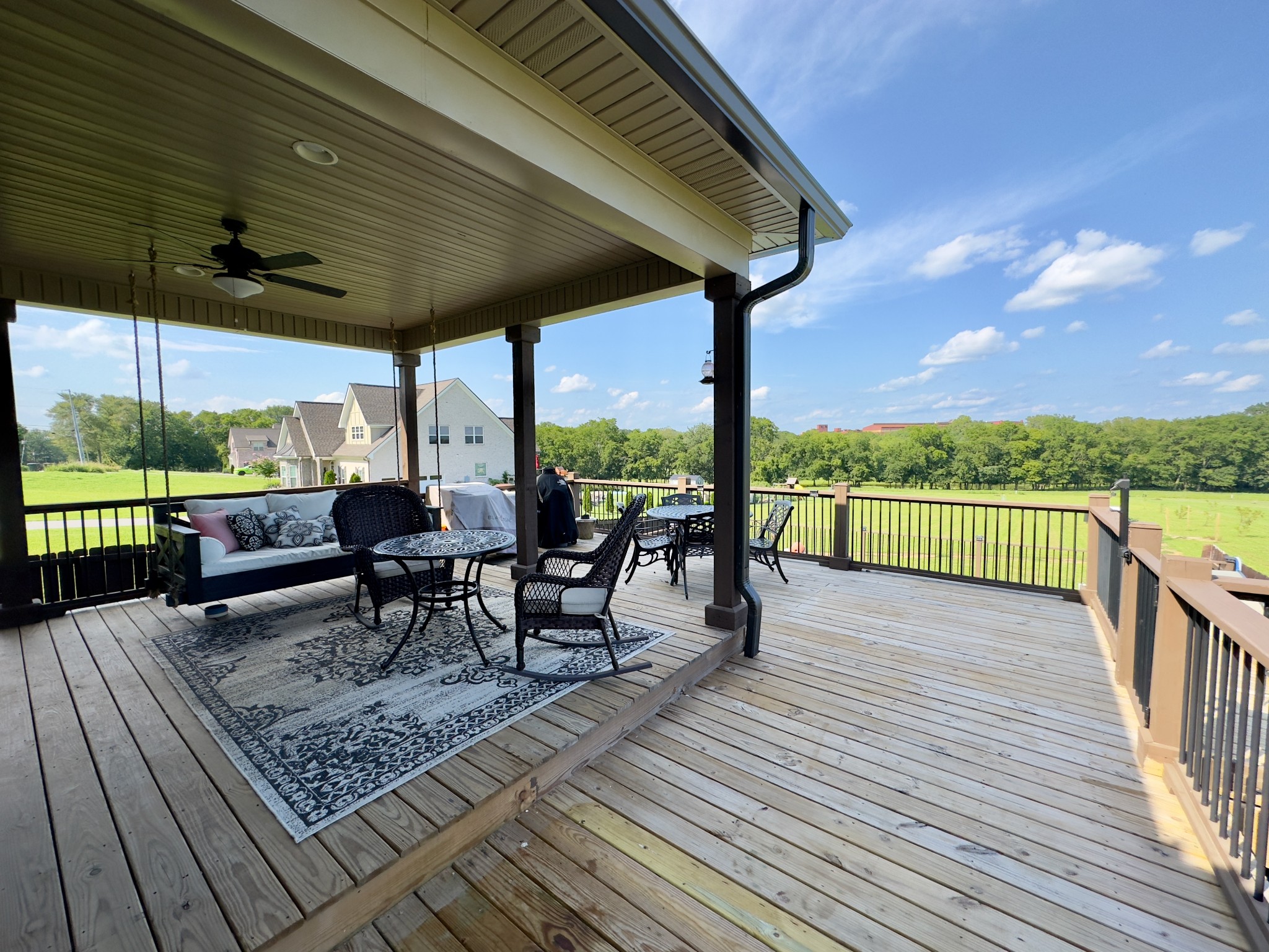 488 Cole's Ferry Road Gallatin, TN 37066 - Photo 17 of 43 a view of a patio with a table chairs and a patio