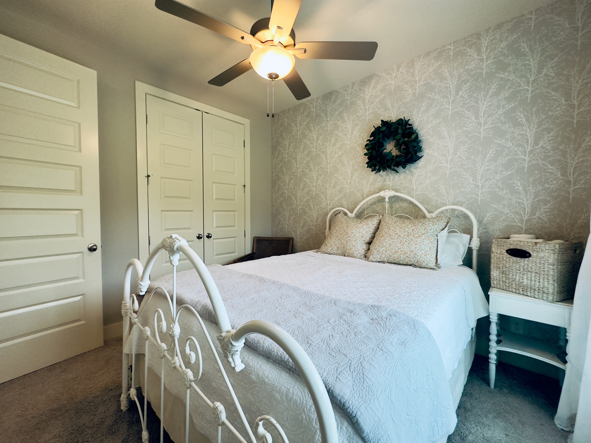 488 Cole's Ferry Road Gallatin, TN 37066 - Photo 23 of 43 a bedroom with a bed and a chandelier
