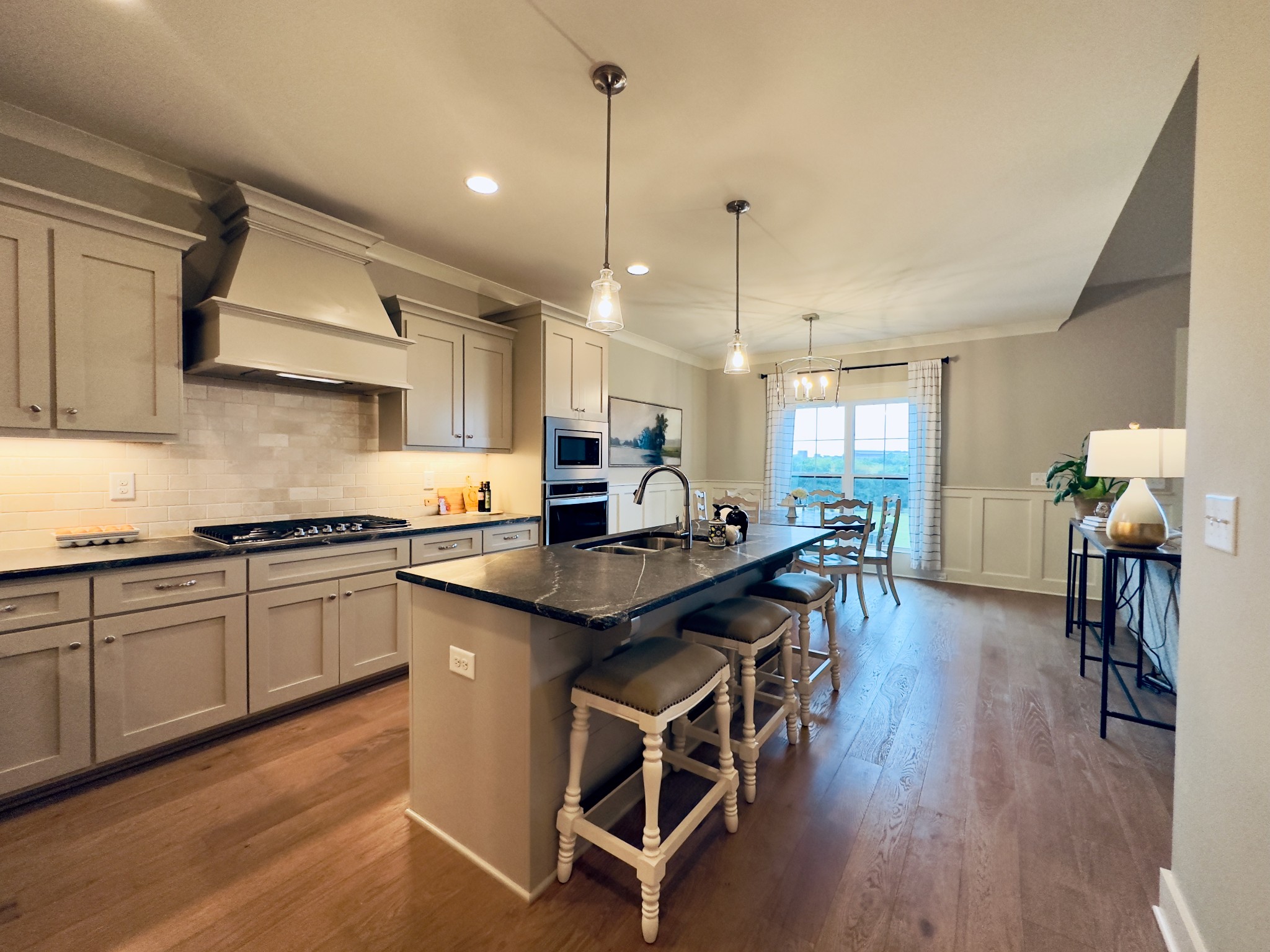 488 Cole's Ferry Road Gallatin, TN 37066 - Photo 24 of 43 a kitchen with sink cabinets and wooden floor