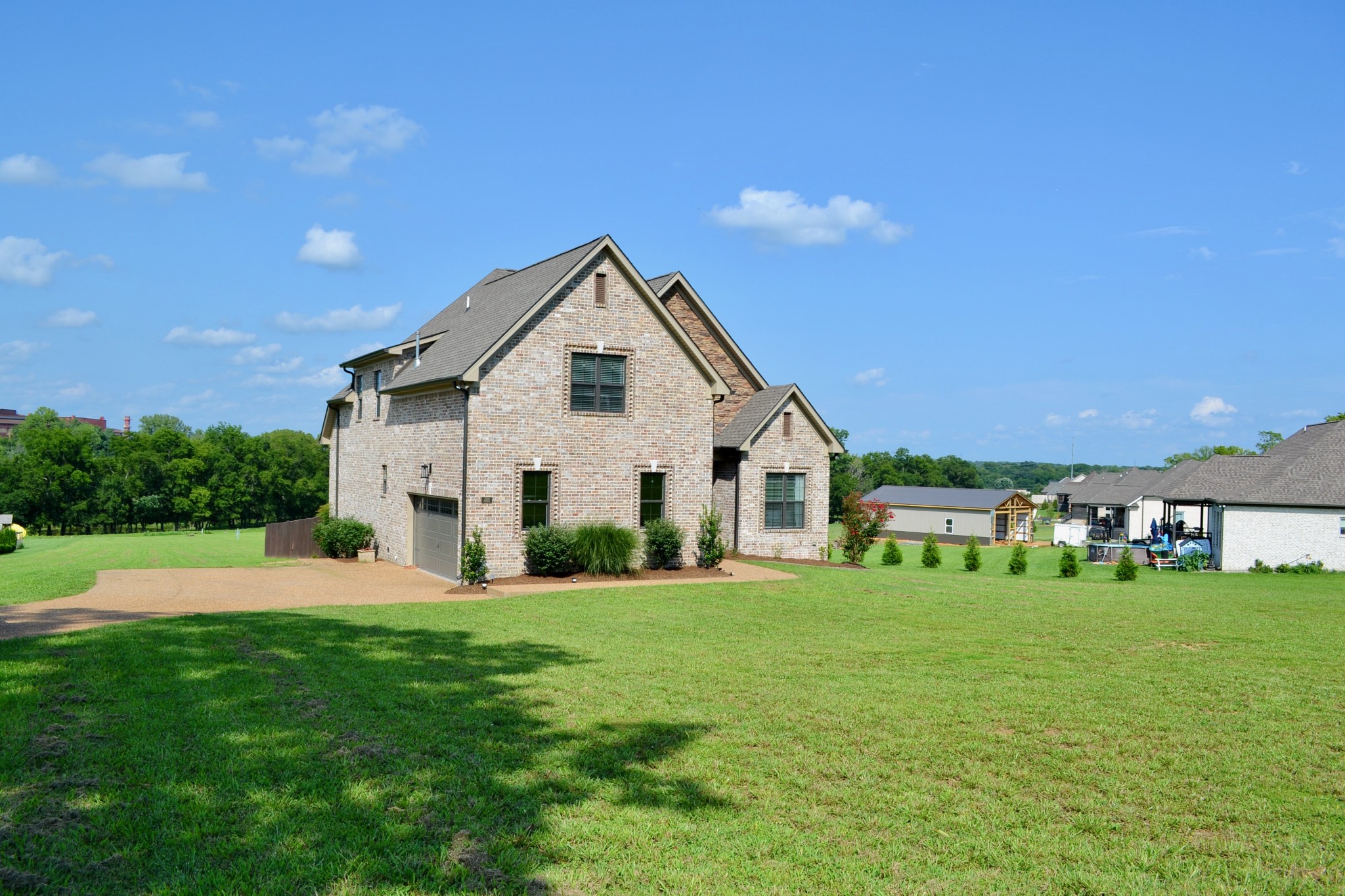 488 Cole's Ferry Road Gallatin, TN 37066 - Photo 3 of 43 a front view of a house with a yard
