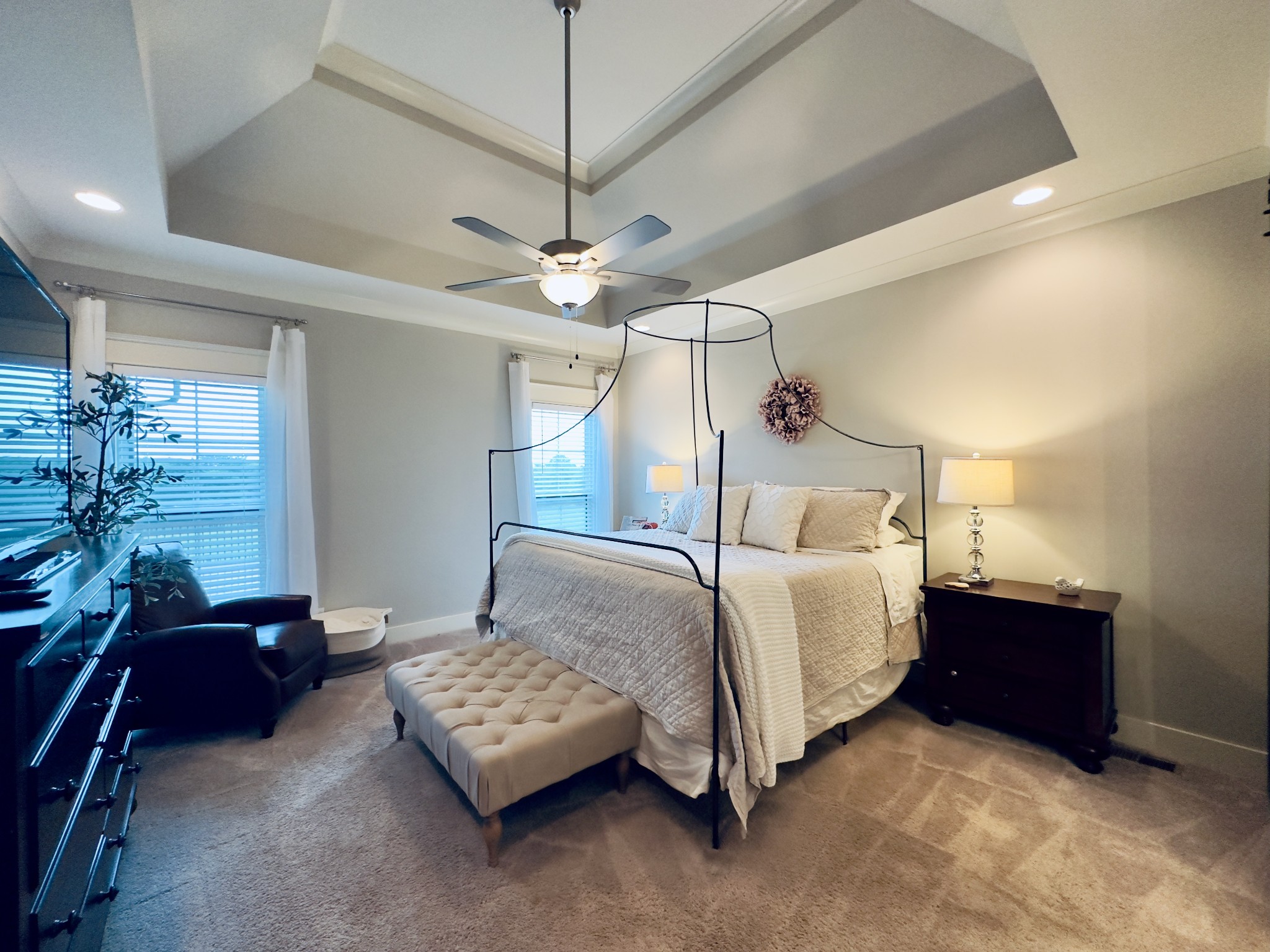 488 Cole's Ferry Road Gallatin, TN 37066 - Photo 34 of 43 a bedroom with a bed and a chandelier