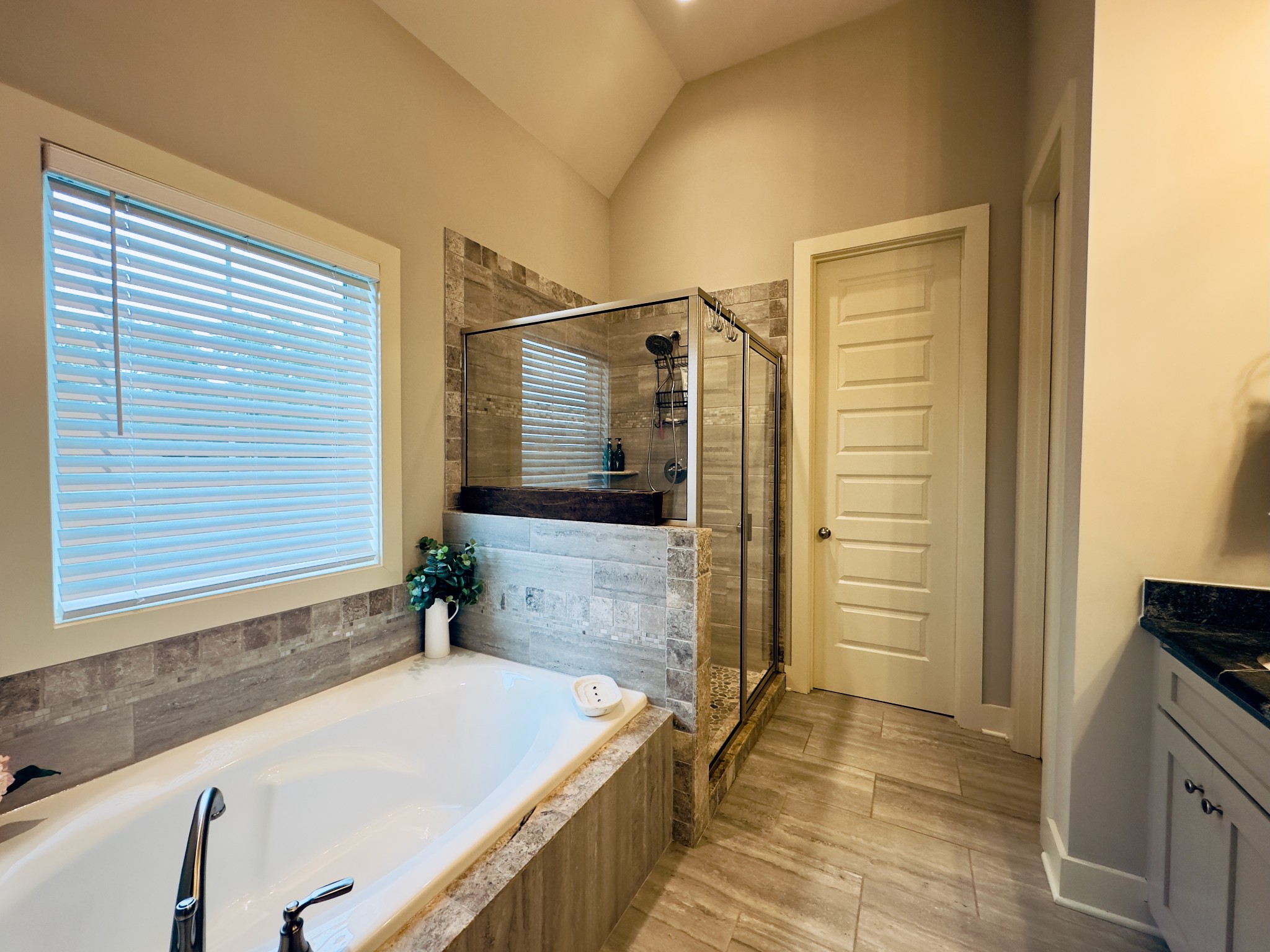 488 Cole's Ferry Road Gallatin, TN 37066 - Photo 35 of 43 a bathroom with a tub a sink and a shower