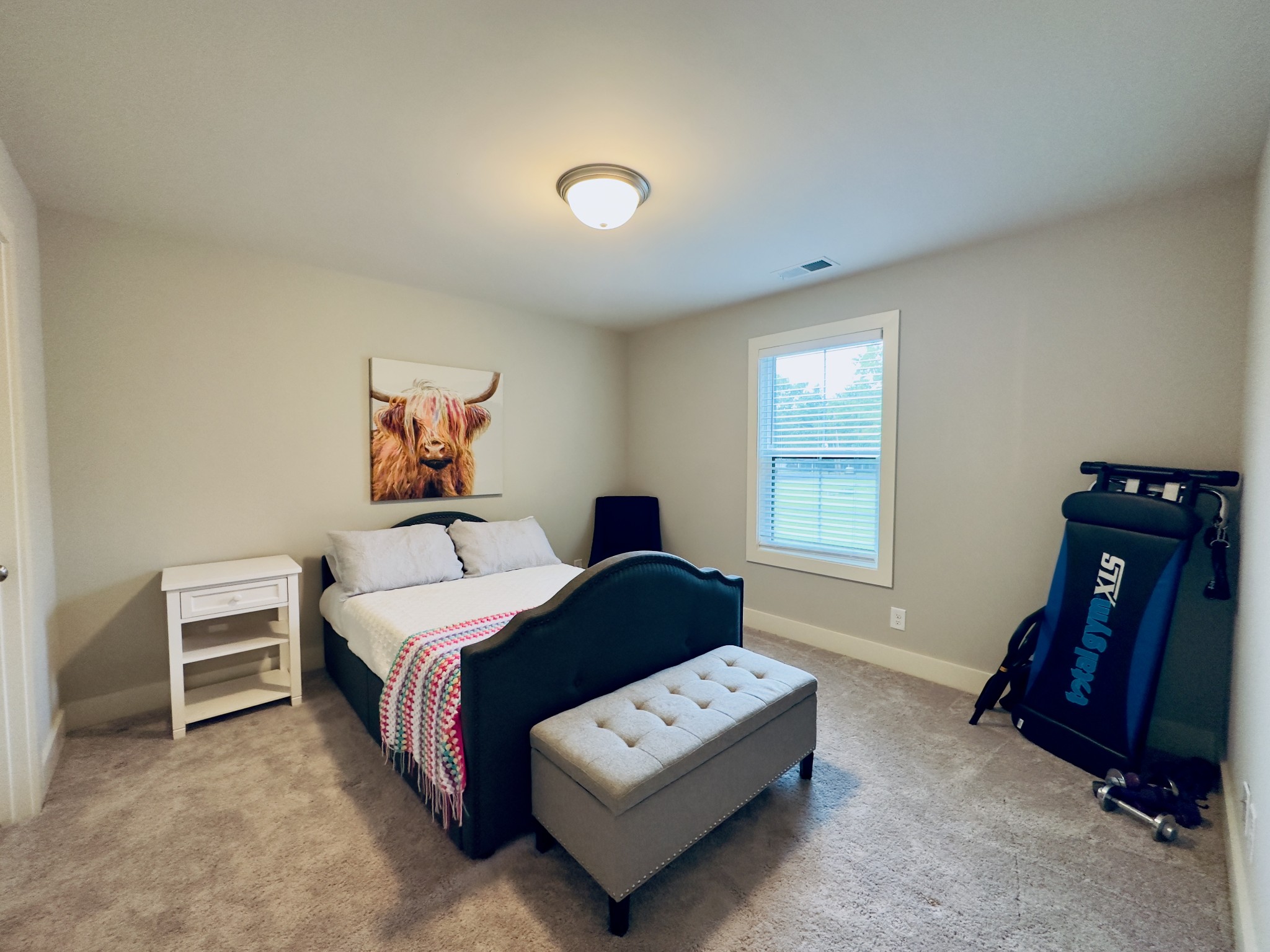 488 Cole's Ferry Road Gallatin, TN 37066 - Photo 37 of 43 a bedroom with a bed and a couch