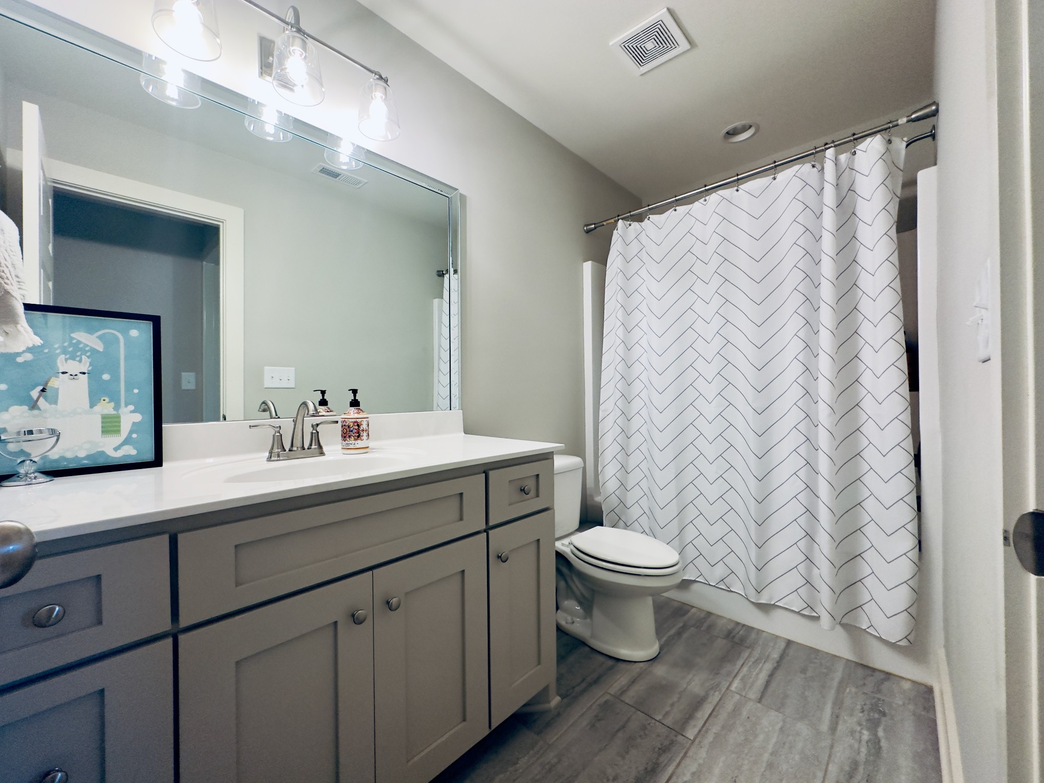 488 Cole's Ferry Road Gallatin, TN 37066 - Photo 39 of 43 a bathroom with a sink and a mirror