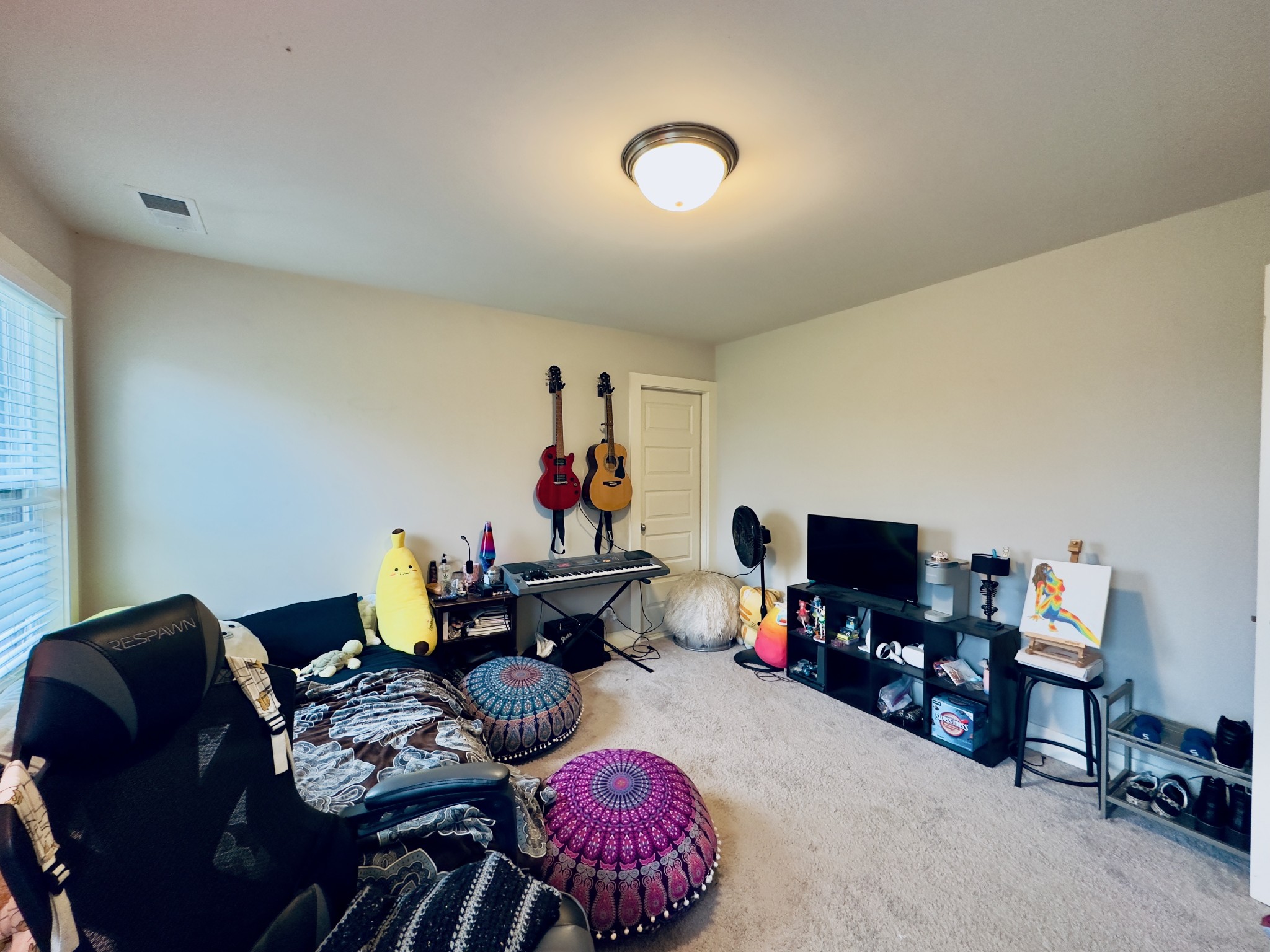 488 Cole's Ferry Road Gallatin, TN 37066 - Photo 43 of 43 a living room with furniture and a flat screen tv