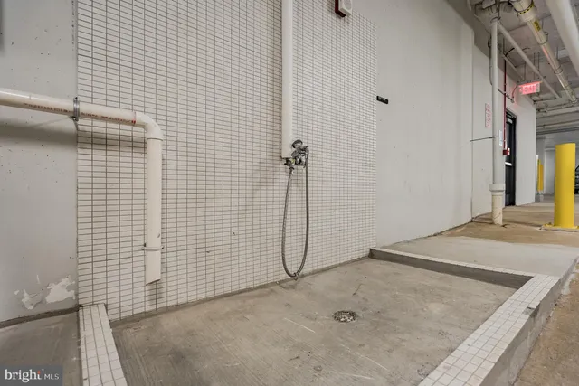 a patio with a table and chairs