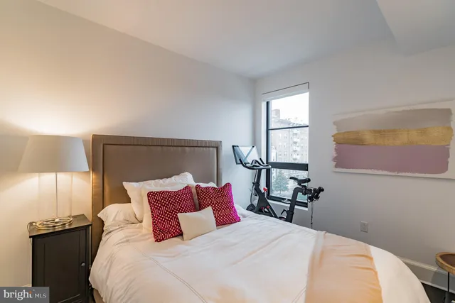 a bathroom with a sink toilet and mirror