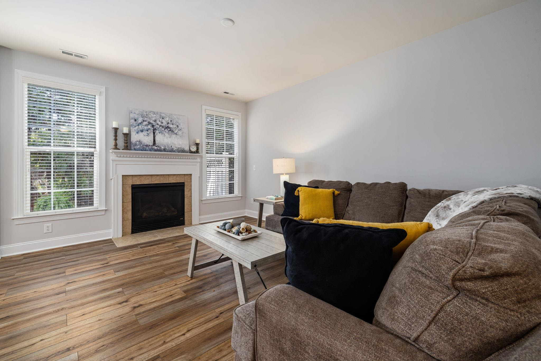 9510 Lost Key Court Raleigh, NC 27617 - Photo 16 of 46 a living room with furniture and a fireplace