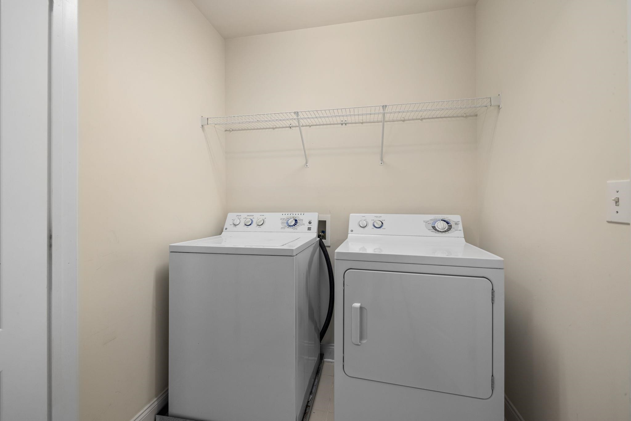9510 Lost Key Court Raleigh, NC 27617 - Photo 27 of 46 a utility room with dryer and washer