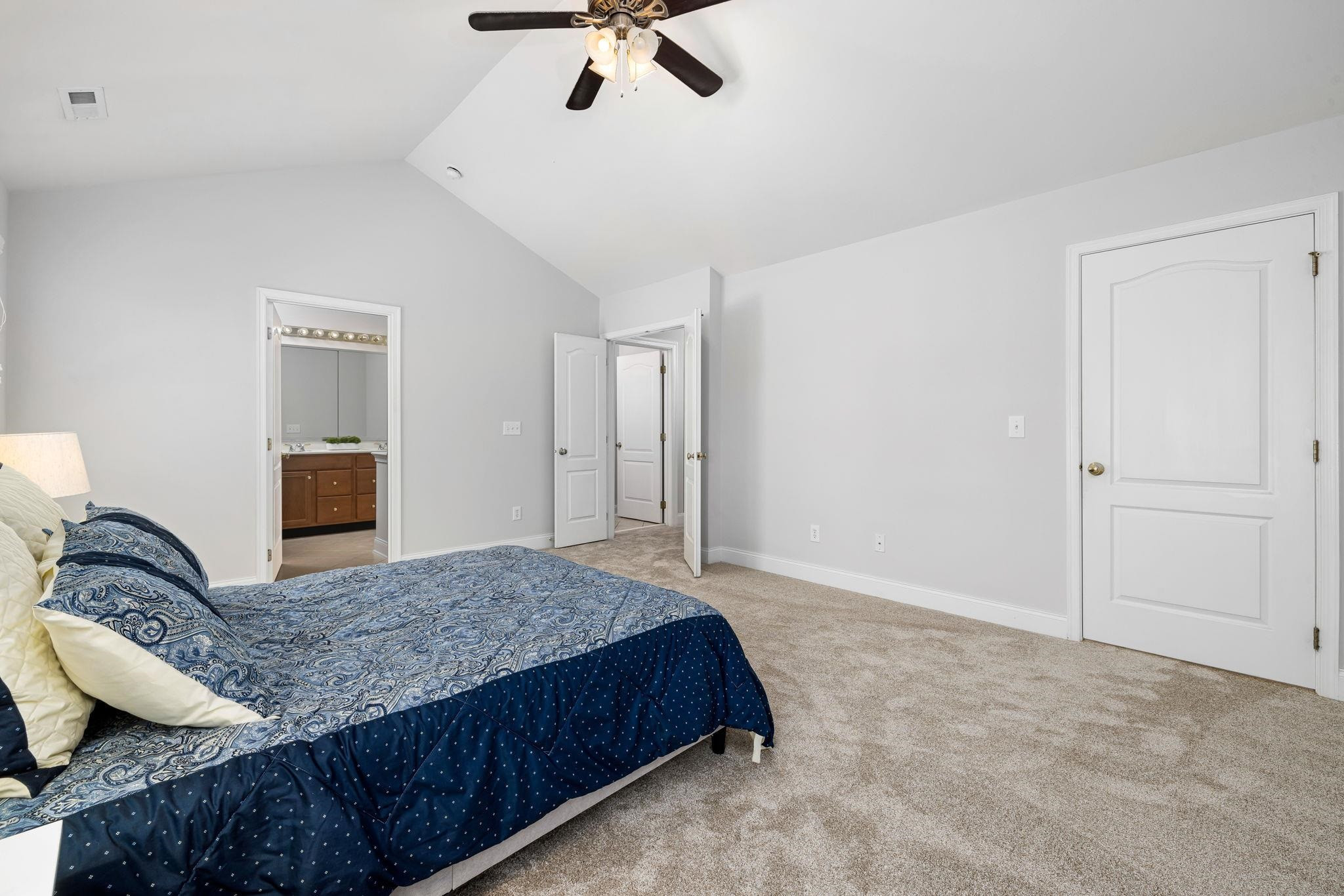 9510 Lost Key Court Raleigh, NC 27617 - Photo 32 of 46 a bedroom with a bed and dresser