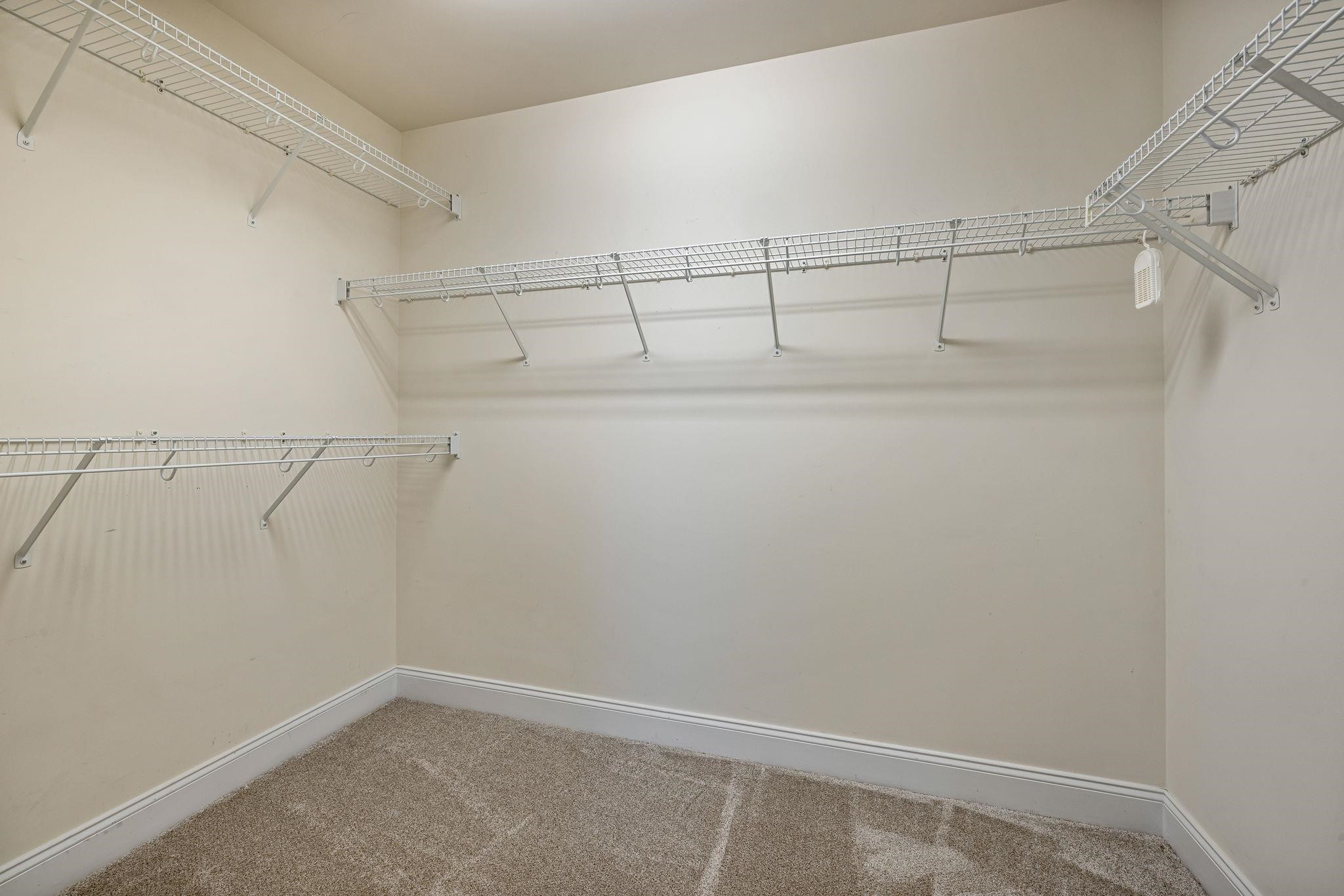 9510 Lost Key Court Raleigh, NC 27617 - Photo 37 of 46 a view of an empty walk in closet