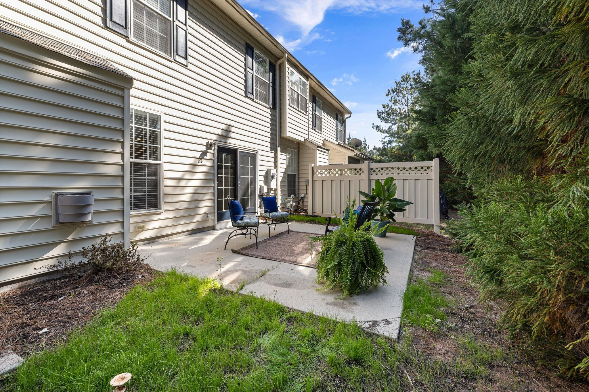 9510 Lost Key Court Raleigh, NC 27617 - Photo 41 of 46 a view of a backyard with plants and patio