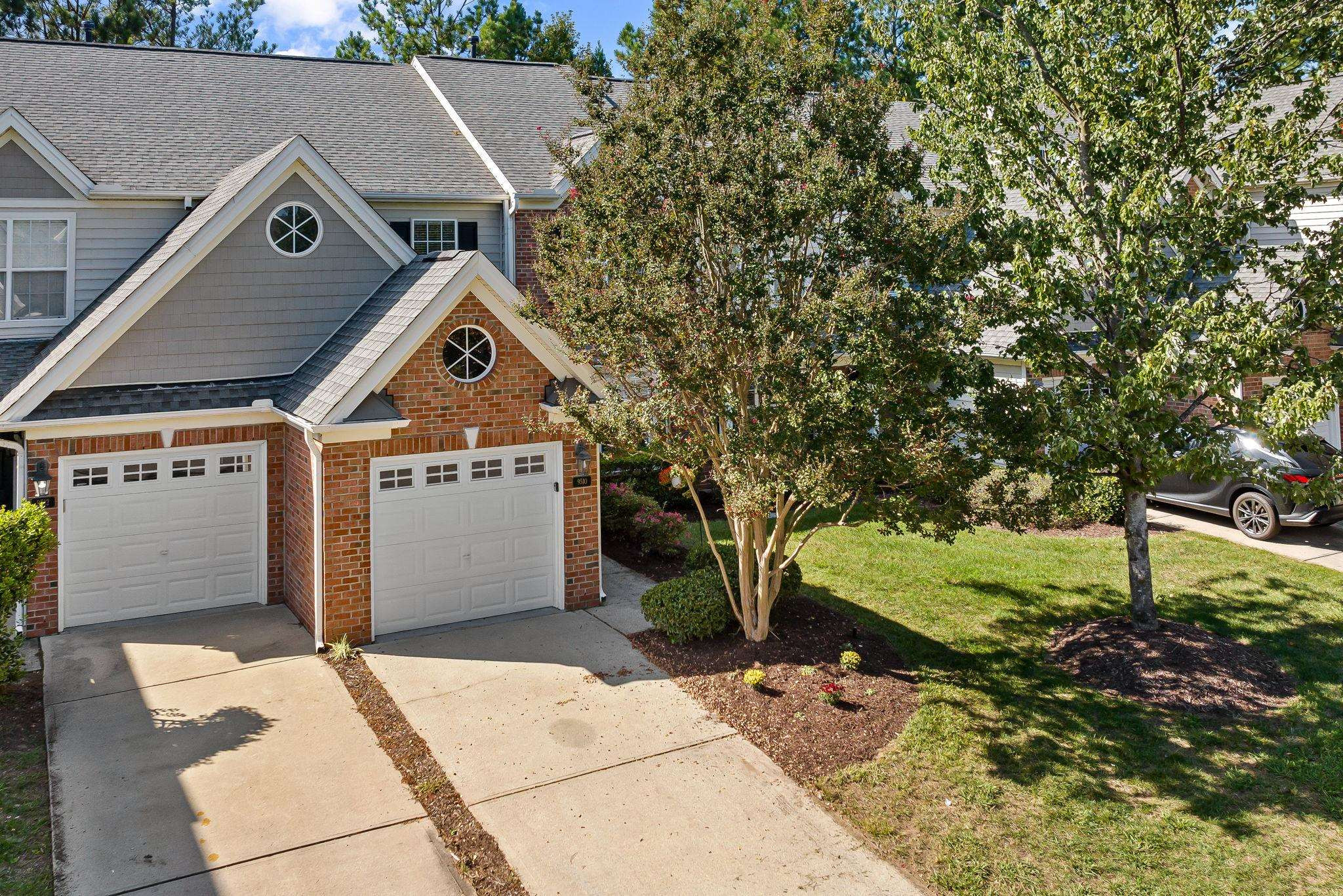 9510 Lost Key Court Raleigh, NC 27617 - Photo 5 of 46 a house view with a outdoor space