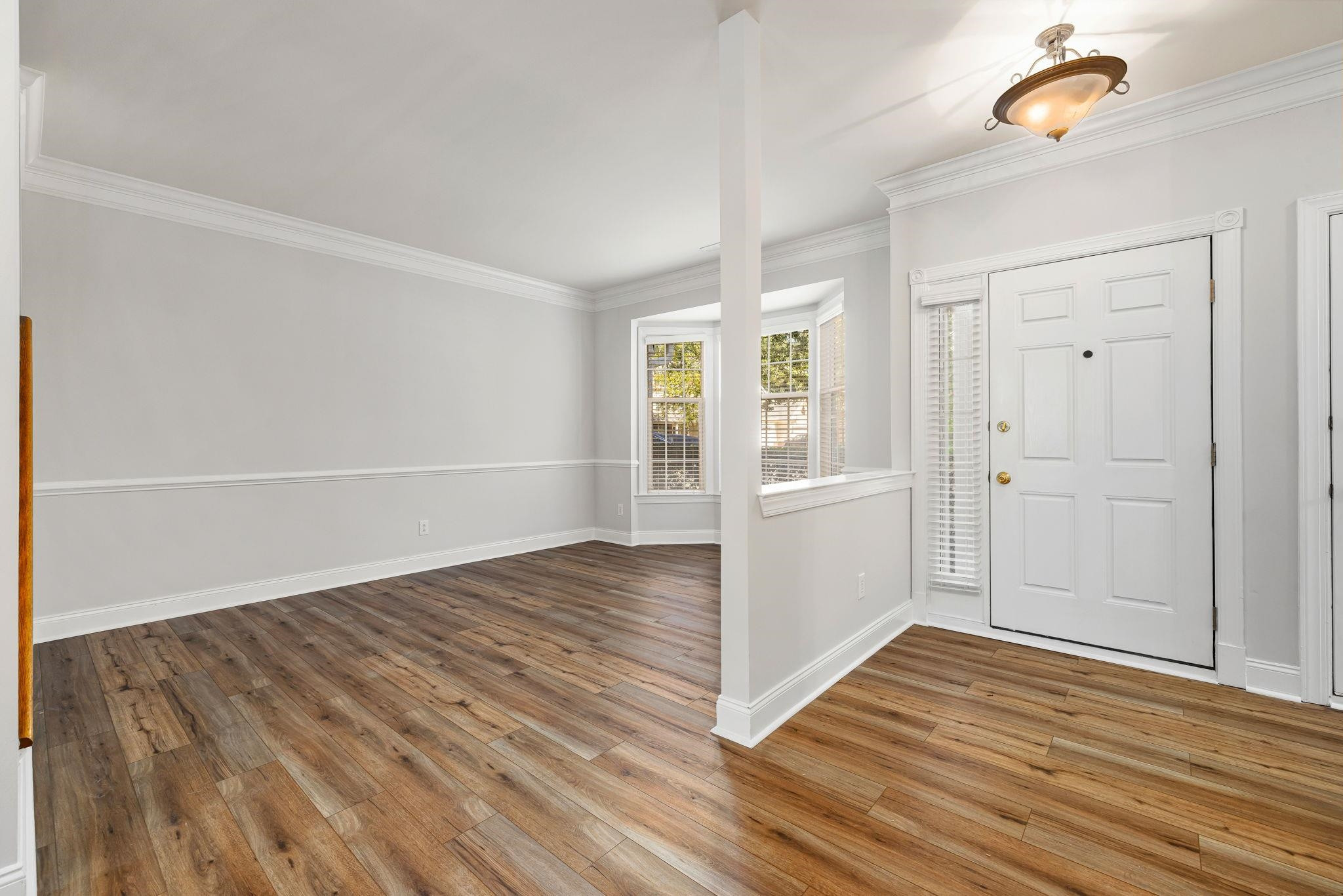 9510 Lost Key Court Raleigh, NC 27617 - Photo 9 of 46 wooden floor in an empty room