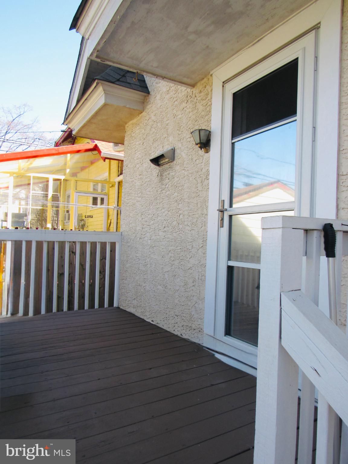 306 South State Road Upper Darby, PA 19082 - Photo 15 of 58 a view of a porch with wooden floor