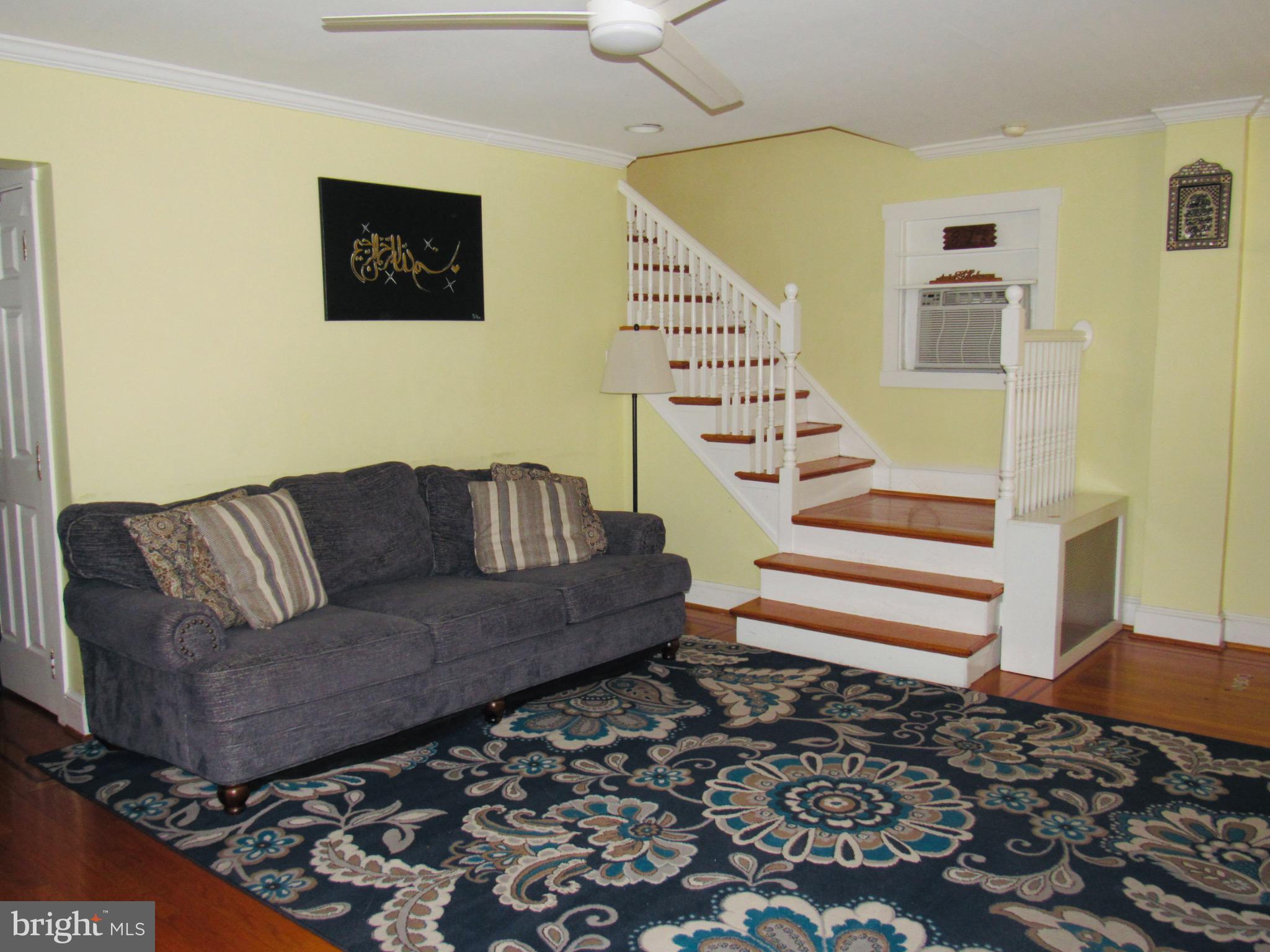 306 South State Road Upper Darby, PA 19082 - Photo 21 of 58 a living room with a couch and a wooden floor