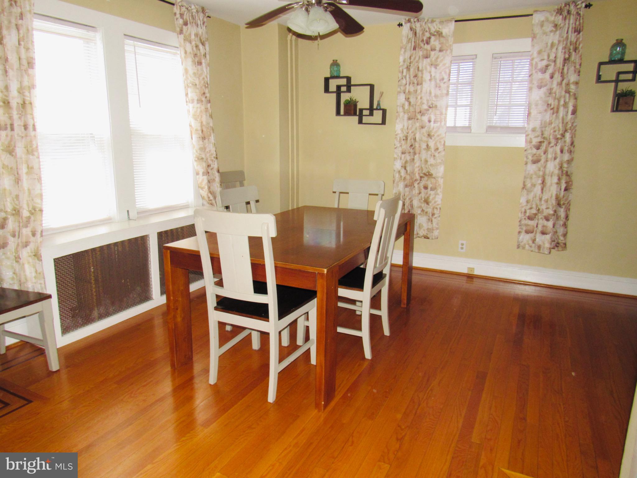 306 South State Road Upper Darby, PA 19082 - Photo 24 of 58 a dining room with furniture and wooden floor