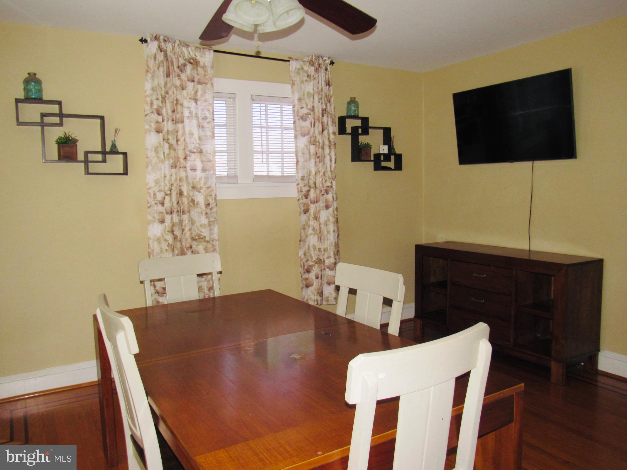 306 South State Road Upper Darby, PA 19082 - Photo 25 of 58 a living room with furniture and a flat screen tv