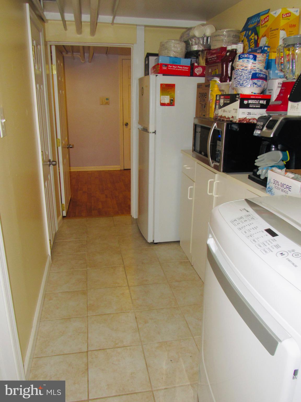 306 South State Road Upper Darby, PA 19082 - Photo 29 of 58 a storage room with washer and dryer