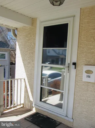 a view of a building with a porch