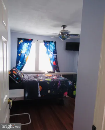 a bedroom with a bed and a shower