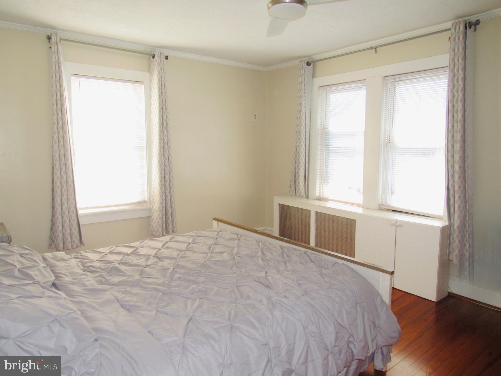 306 South State Road Upper Darby, PA 19082 - Photo 47 of 58 a bedroom with a bed and a window