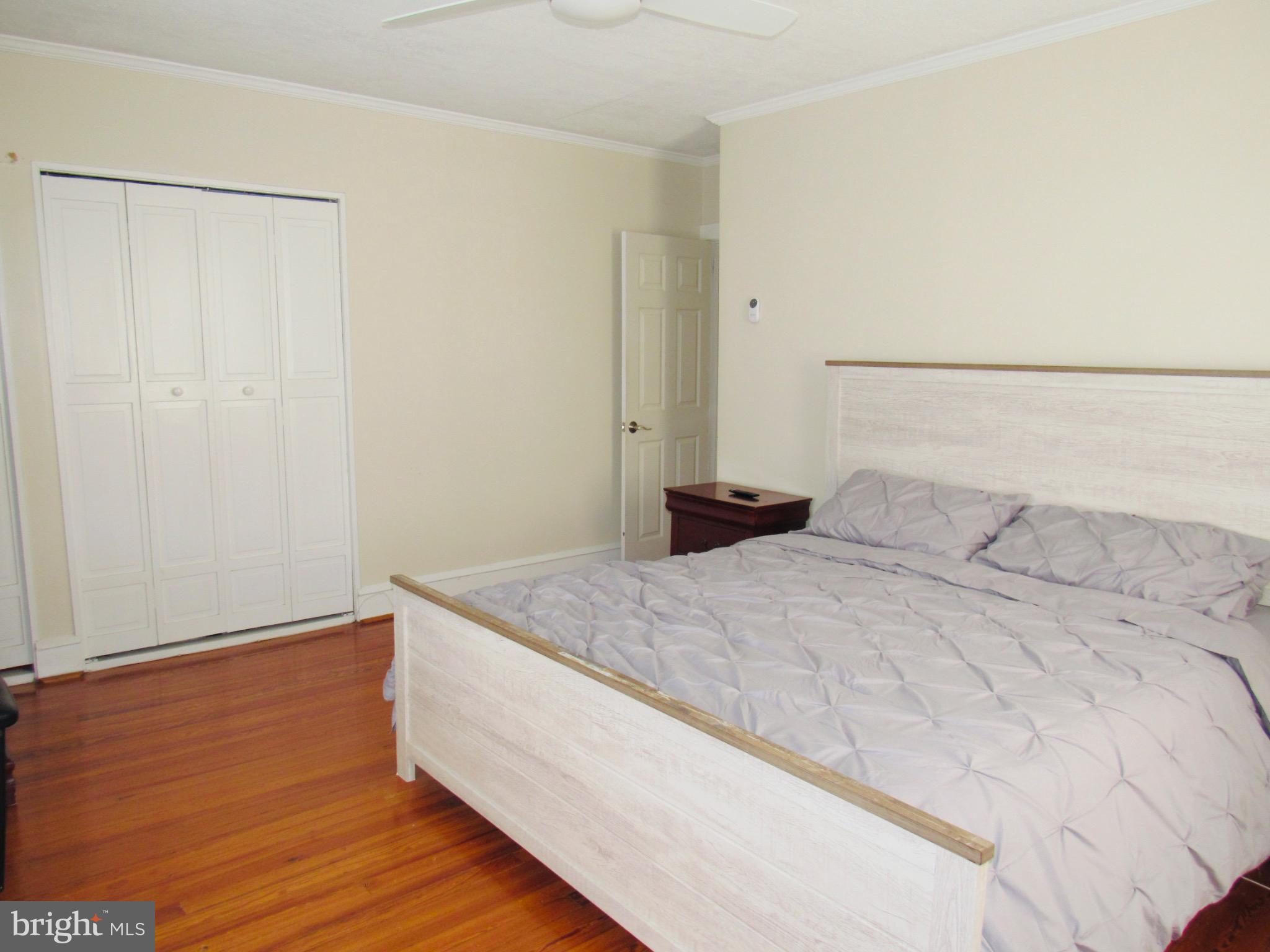 306 South State Road Upper Darby, PA 19082 - Photo 48 of 58 a bedroom with a bed and a shower