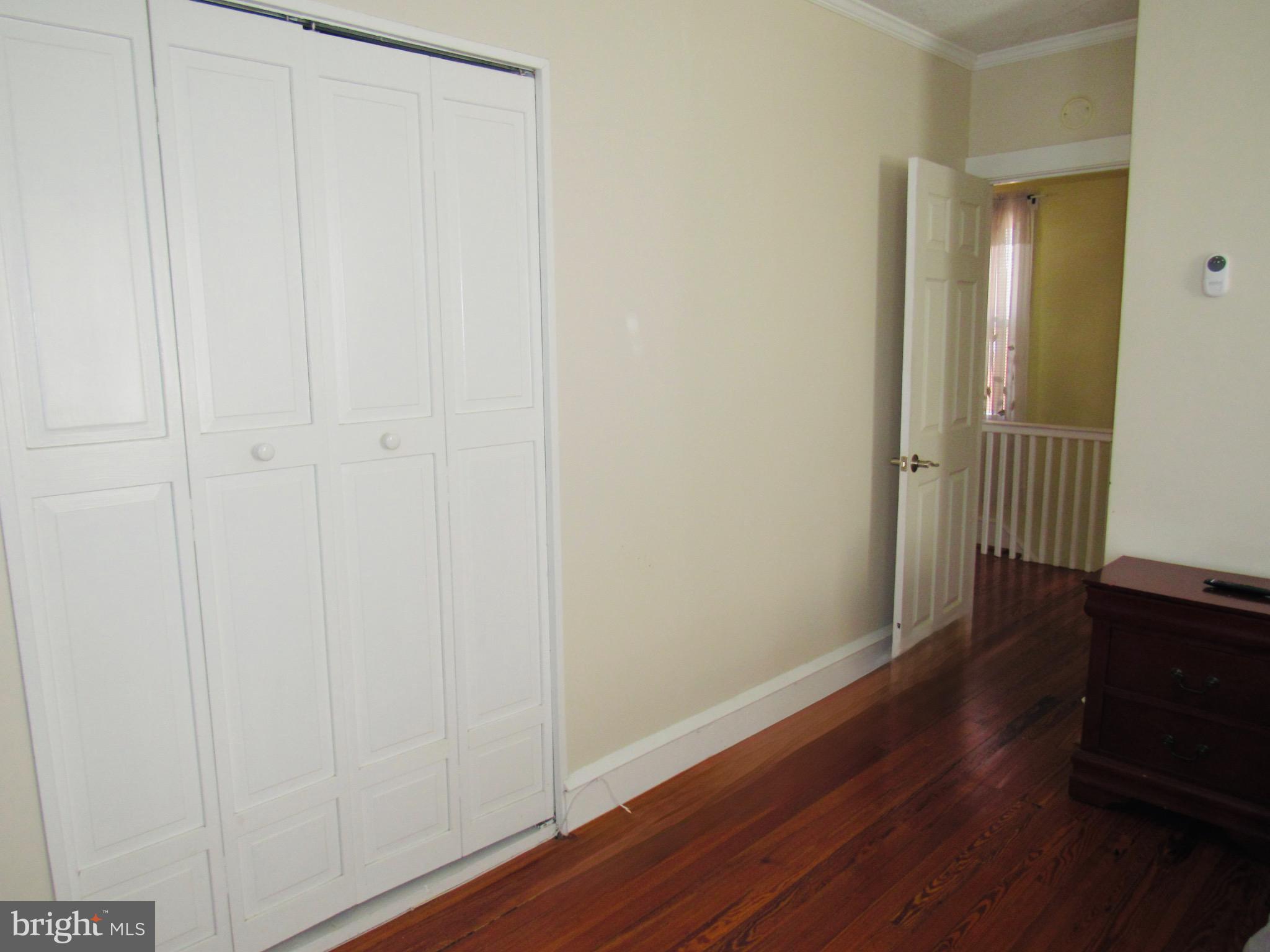 306 South State Road Upper Darby, PA 19082 - Photo 49 of 58 a view of a hallway with wooden floor