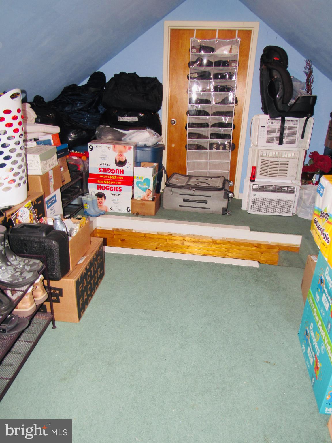 306 South State Road Upper Darby, PA 19082 - Photo 57 of 58 a backyard of a house with wooden floor and ceiling fan
