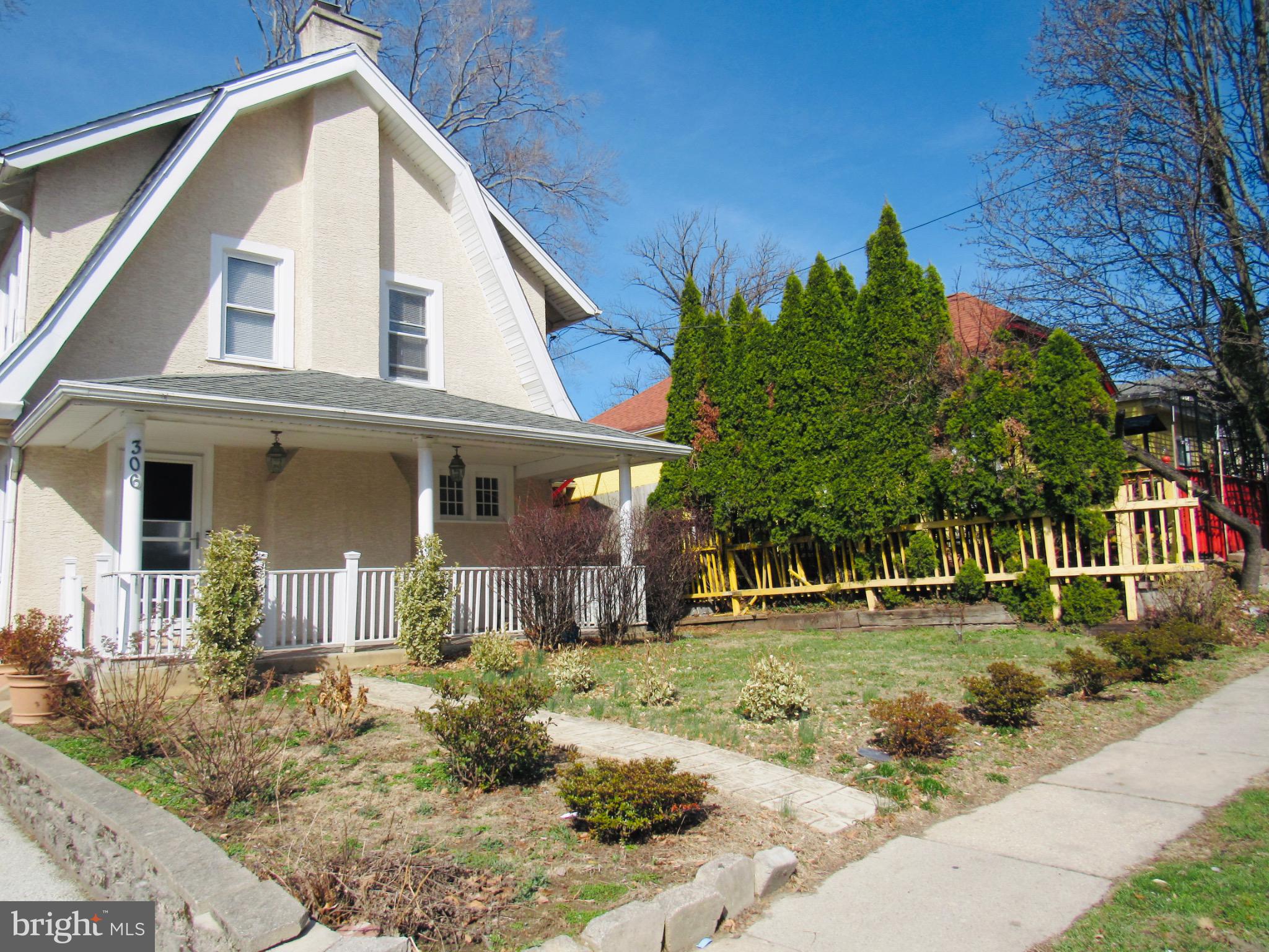306 South State Road Upper Darby, PA 19082 - Photo 7 of 58 a front view of a house with a yard