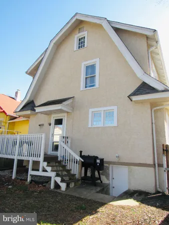 a view of a backyard of the house