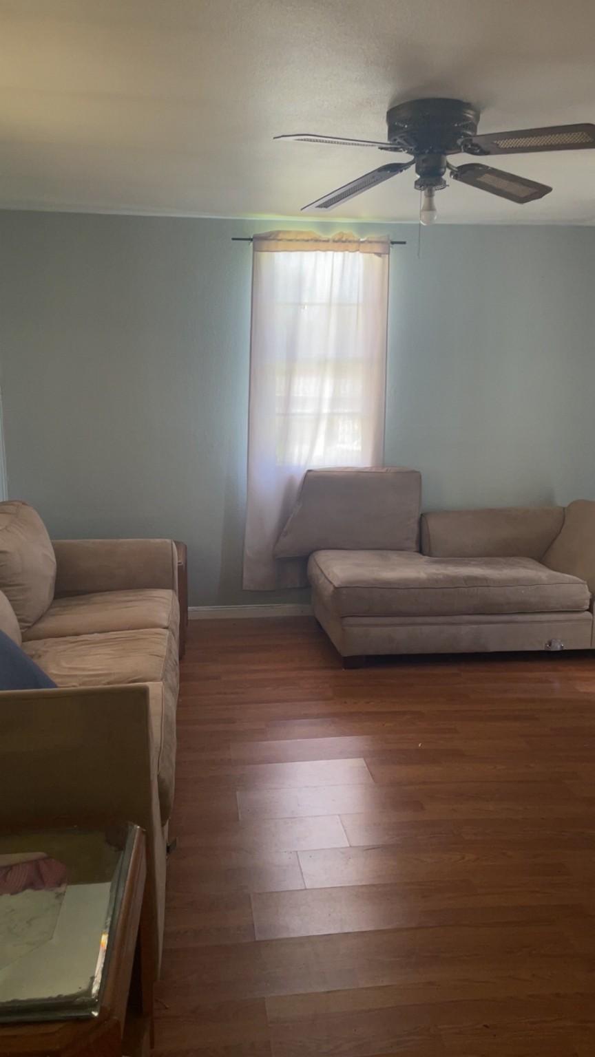 2365 U.S. Highway 190 Huntsville, TX 77340 - Photo 9 of 12 a living room with furniture and a window