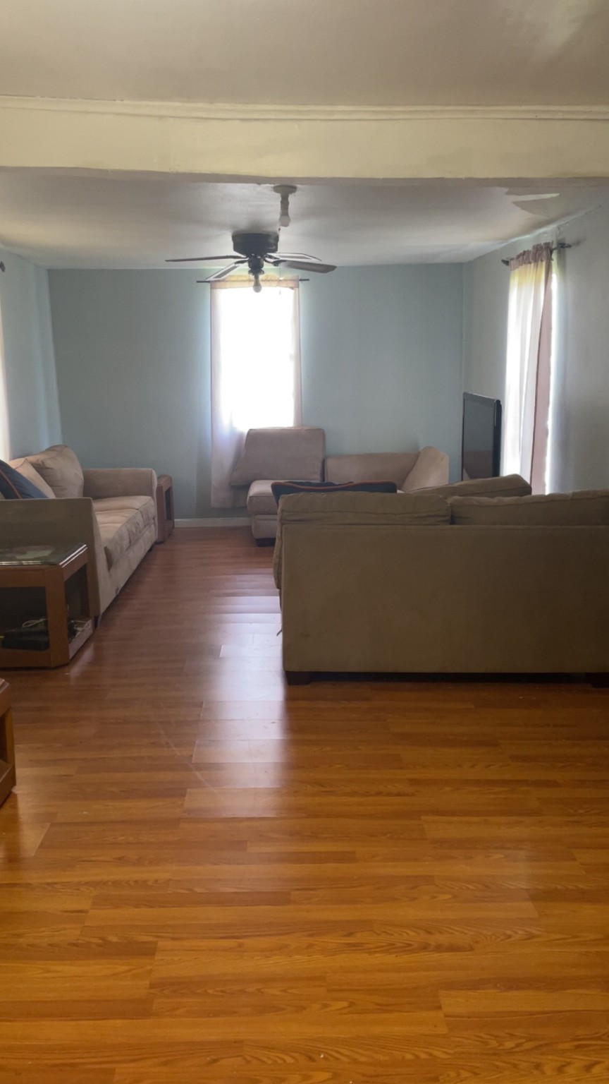 2365 U.S. Highway 190 Huntsville, TX 77340 - Photo 10 of 12 a living room with furniture and a flat screen tv