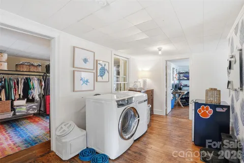 a view of livingroom with washer and dryer