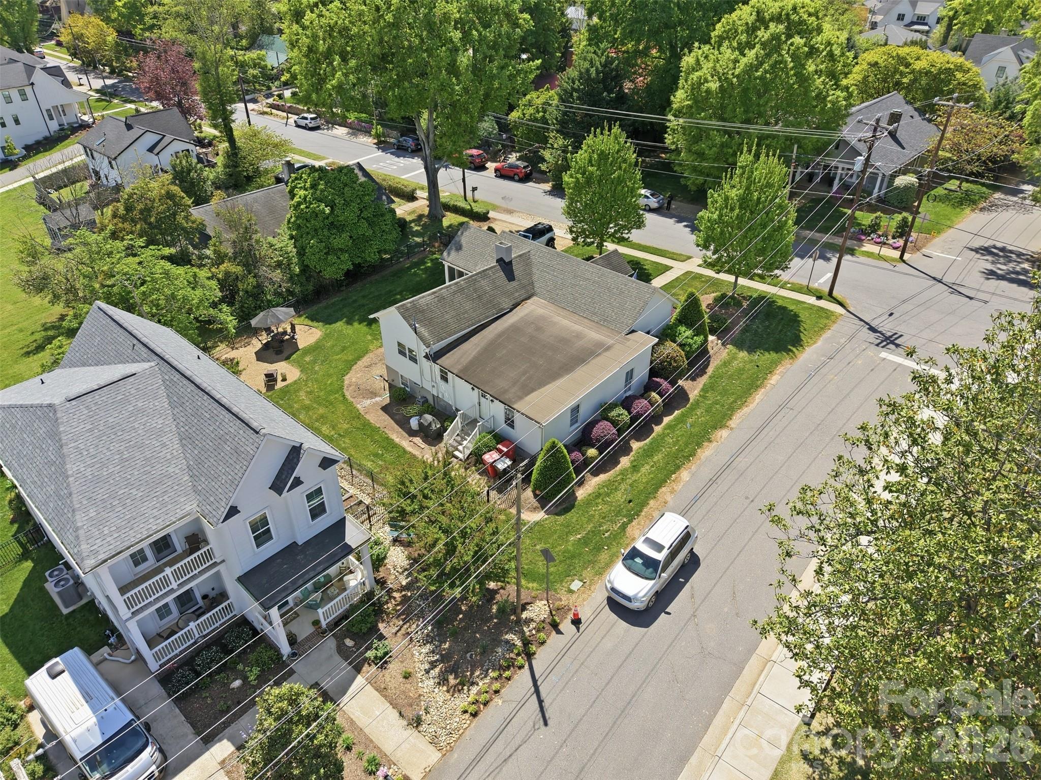 303 South Street Davidson, NC 28036 - Photo 29 of 37 an aerial view of a house with outdoor space