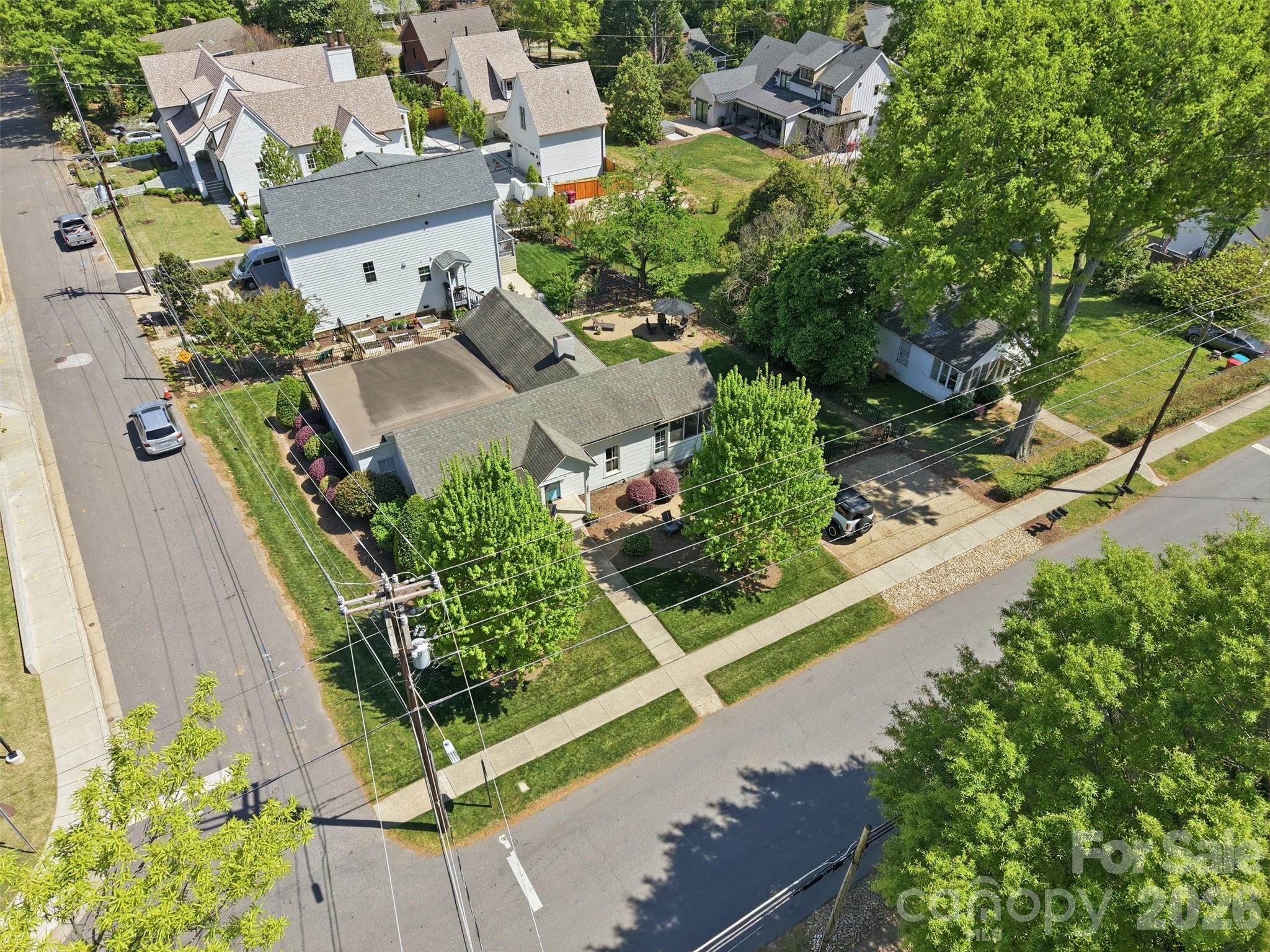 303 South Street Davidson, NC 28036 - Photo 32 of 37 an aerial view of residential house with outdoor space
