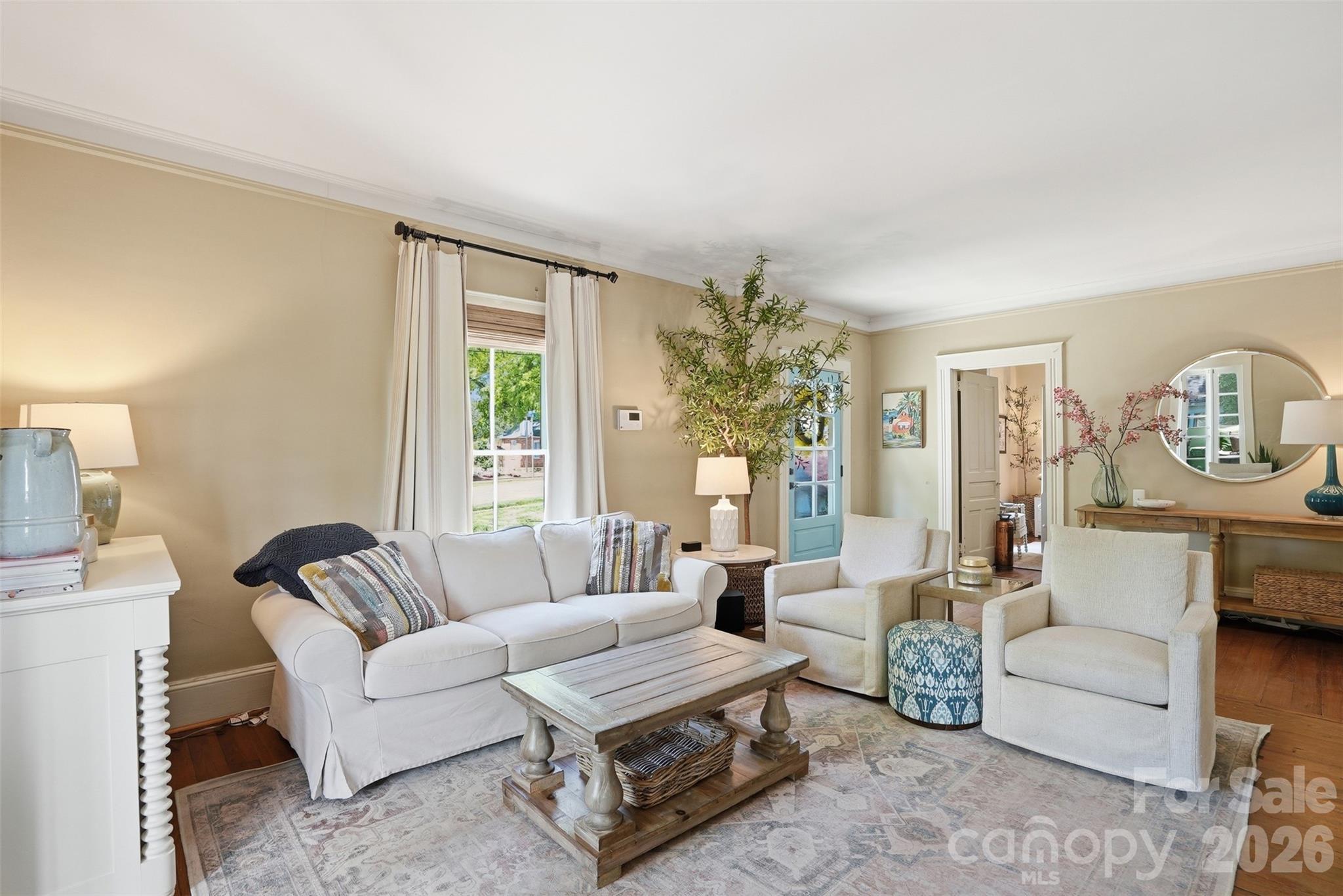 303 South Street Davidson, NC 28036 - Photo 6 of 37 a living room with furniture and a large window