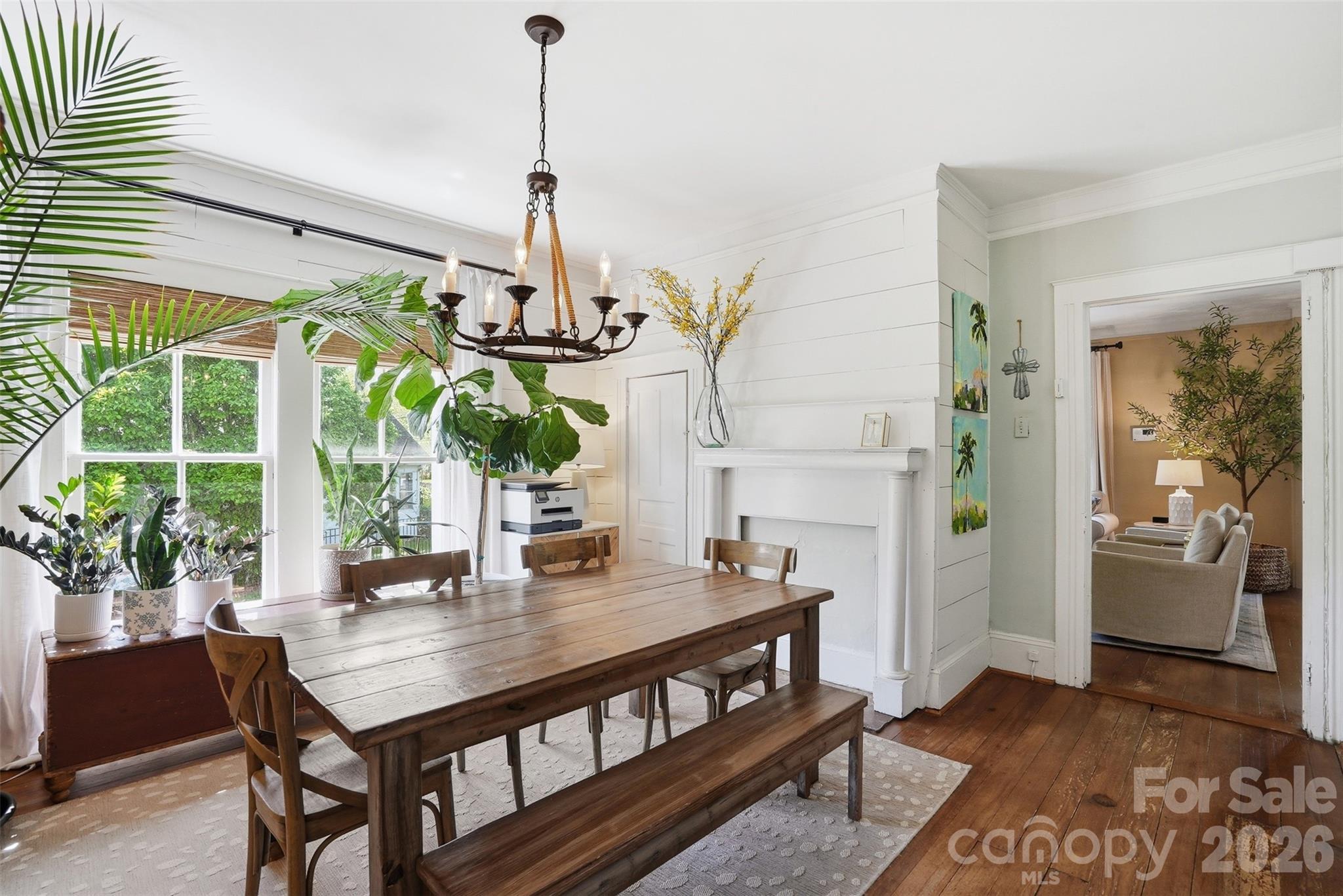 303 South Street Davidson, NC 28036 - Photo 8 of 37 a view of a dining room with furniture window and wooden floor