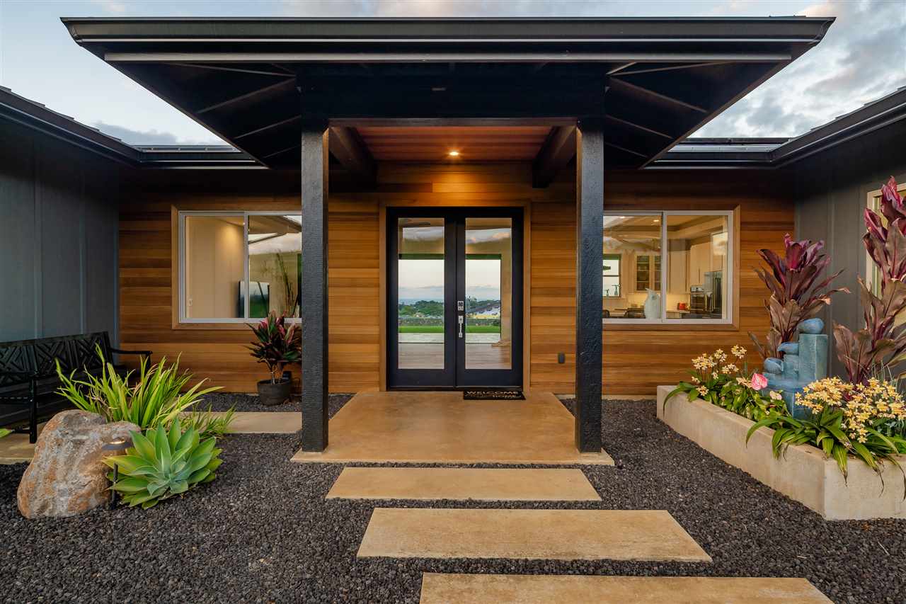 940 Auwaha Street, Unit A Haiku, HI 96708 - Photo 24 of 28 a living room with a rug